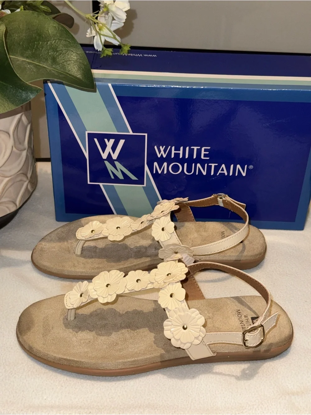 White Mountain Liftoff Flat Sandals feature delicate floral applique on T-strap